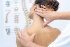 Doctor hand Physicist physical therapy treatment patient in the clinic. Orthopedic medical exam in doctor's hospital office Partnership, traumatology and medical consultation for neck injury